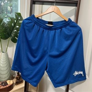 Stussy Blue Mesh Athletic Shorts with White Logo